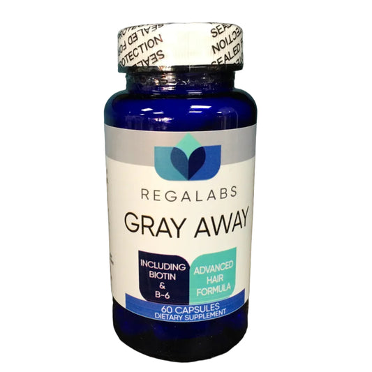 Bottle of Regalabs Gray Away supplement on a wooden surface with a blue background