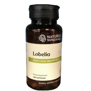 Nature's Sunshine Lobelia supplement bottle on a wooden surface with a blurred blue background