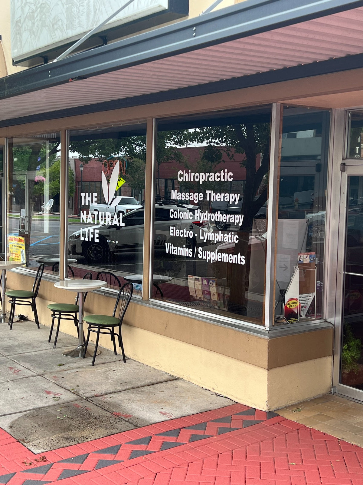 The Natural Life wellness center storefront in downtown Dalton, Georgia